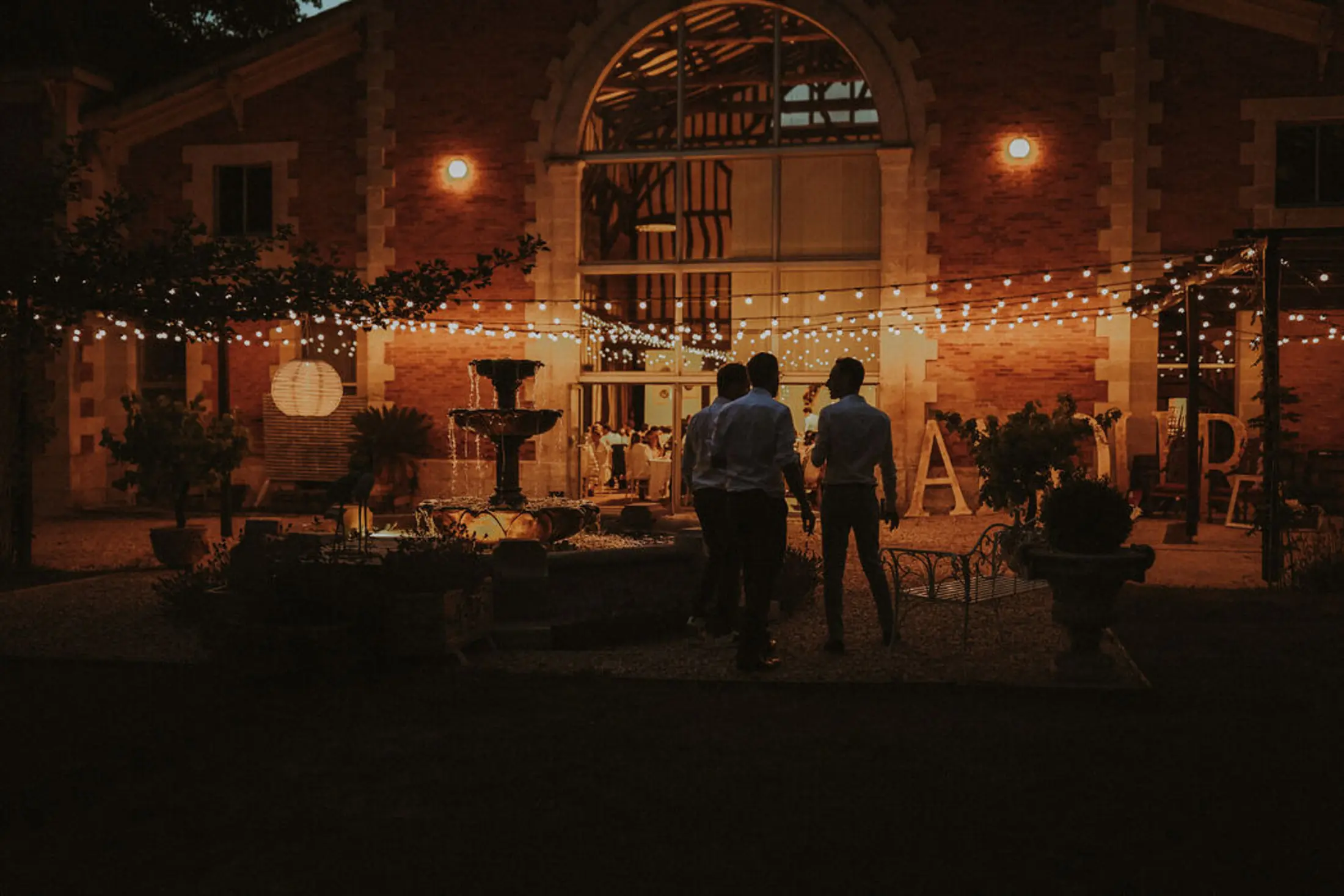 The reception hall and the fountain under festoon lights