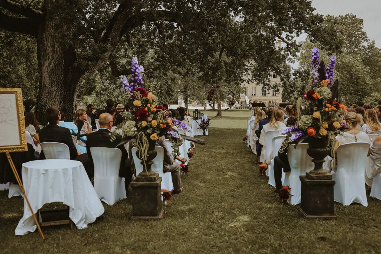 A ceremony and its flower vases on plinths